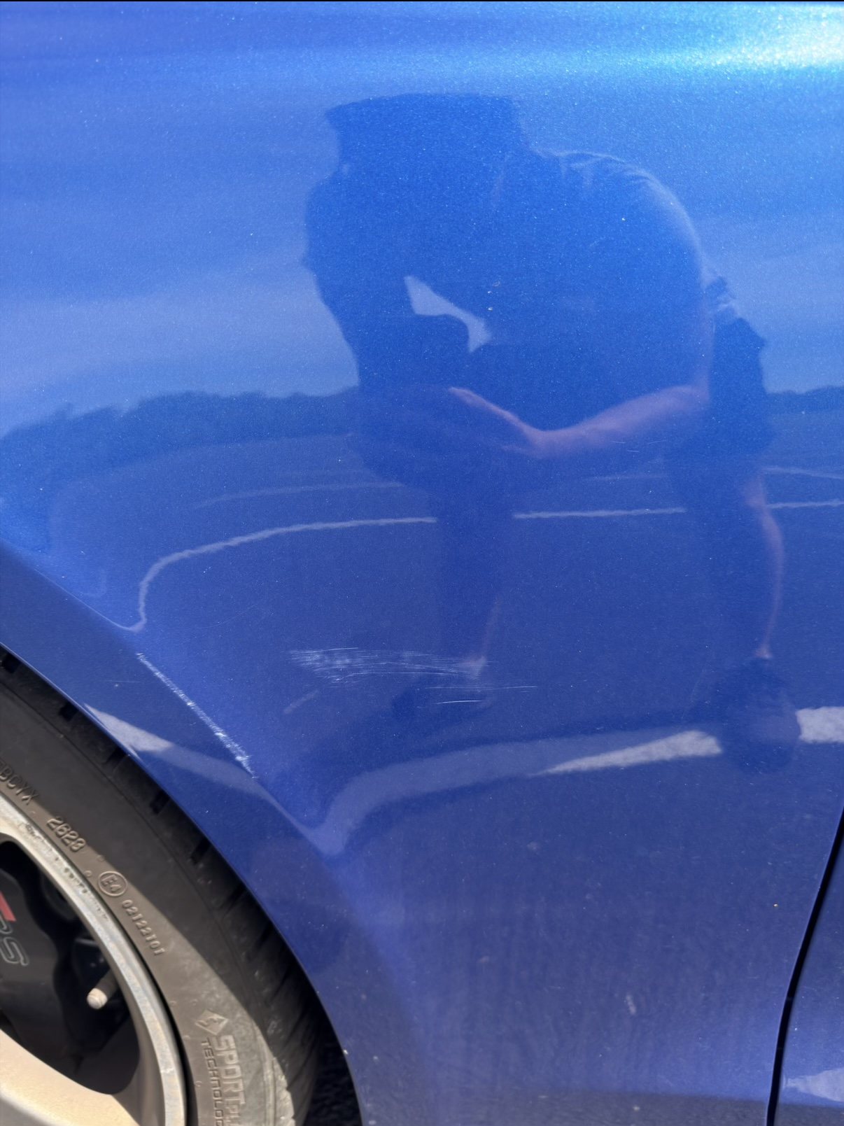Audi fender scratches, corrected, before